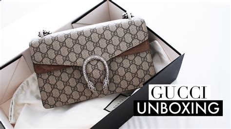 GUCCI DIONYSUS FIRST IMPRESSION .